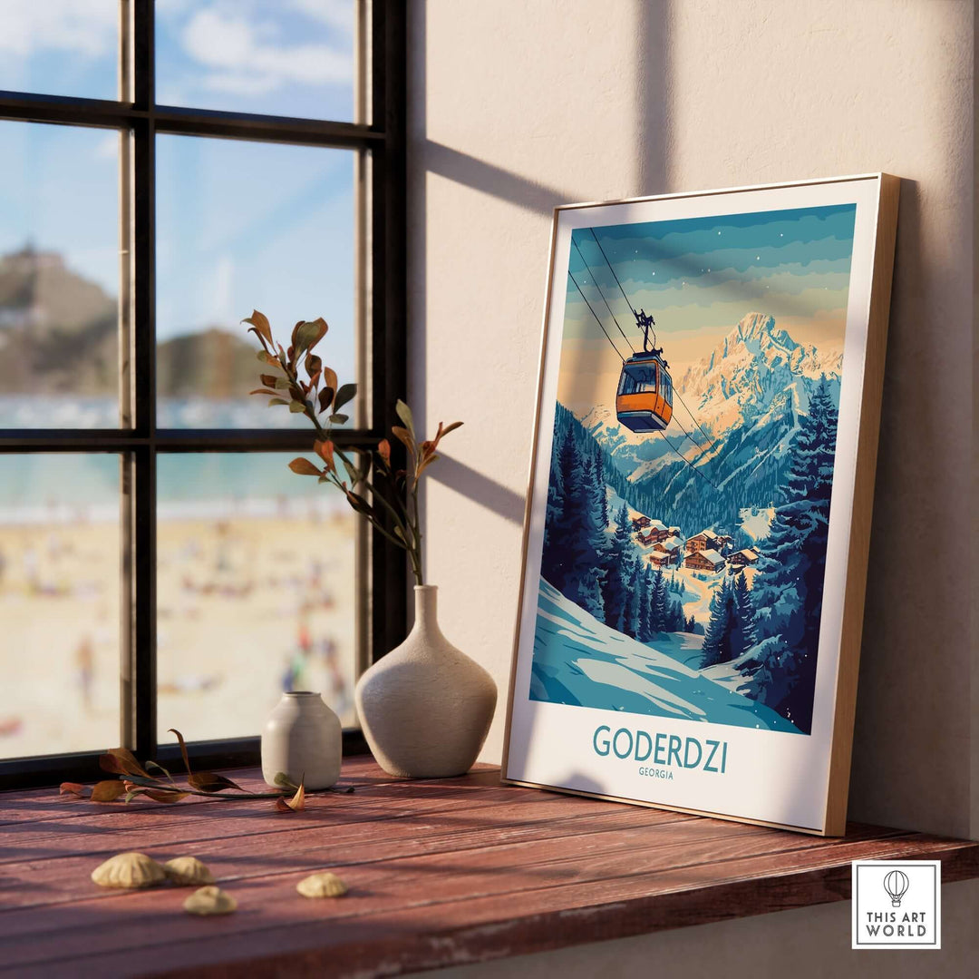 Goderdzi Poster showcasing a ski resort view in Georgia, framed on a wooden table near a window. Perfect for travel and skiing enthusiasts.