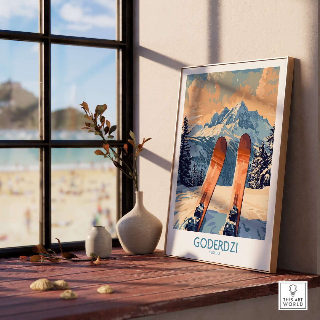 Goderdzi Ski Poster displayed on a wooden table by a window, showcasing ski slopes and mountains in a scenic design.