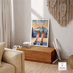 Goderdzi Ski Print displayed in a cozy living room setting, showcasing scenic mountains and ski equipment. Perfect for ski enthusiasts.