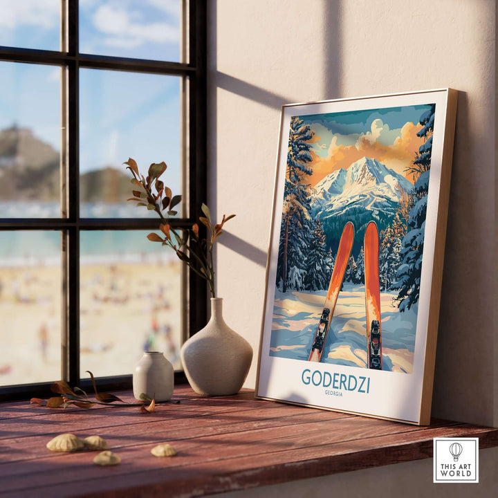 Framed Goderdzi Ski Wall Art Poster showcasing snowy mountains and skis, brightening a sunny room with coastal view.