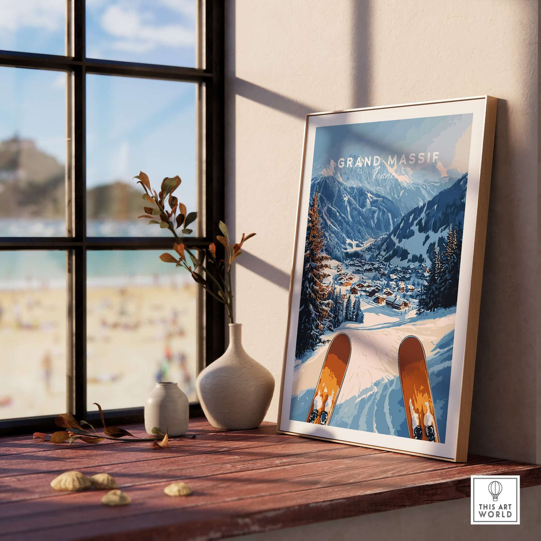 Grand Massif Ski Wall Art in a stylish frame on a wooden table with a scenic view through the window.