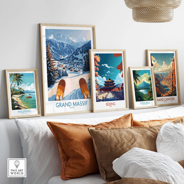 Grand Massif Ski Wall Art Print showcasing ski slopes among other travel-themed prints on a stylish shelf.