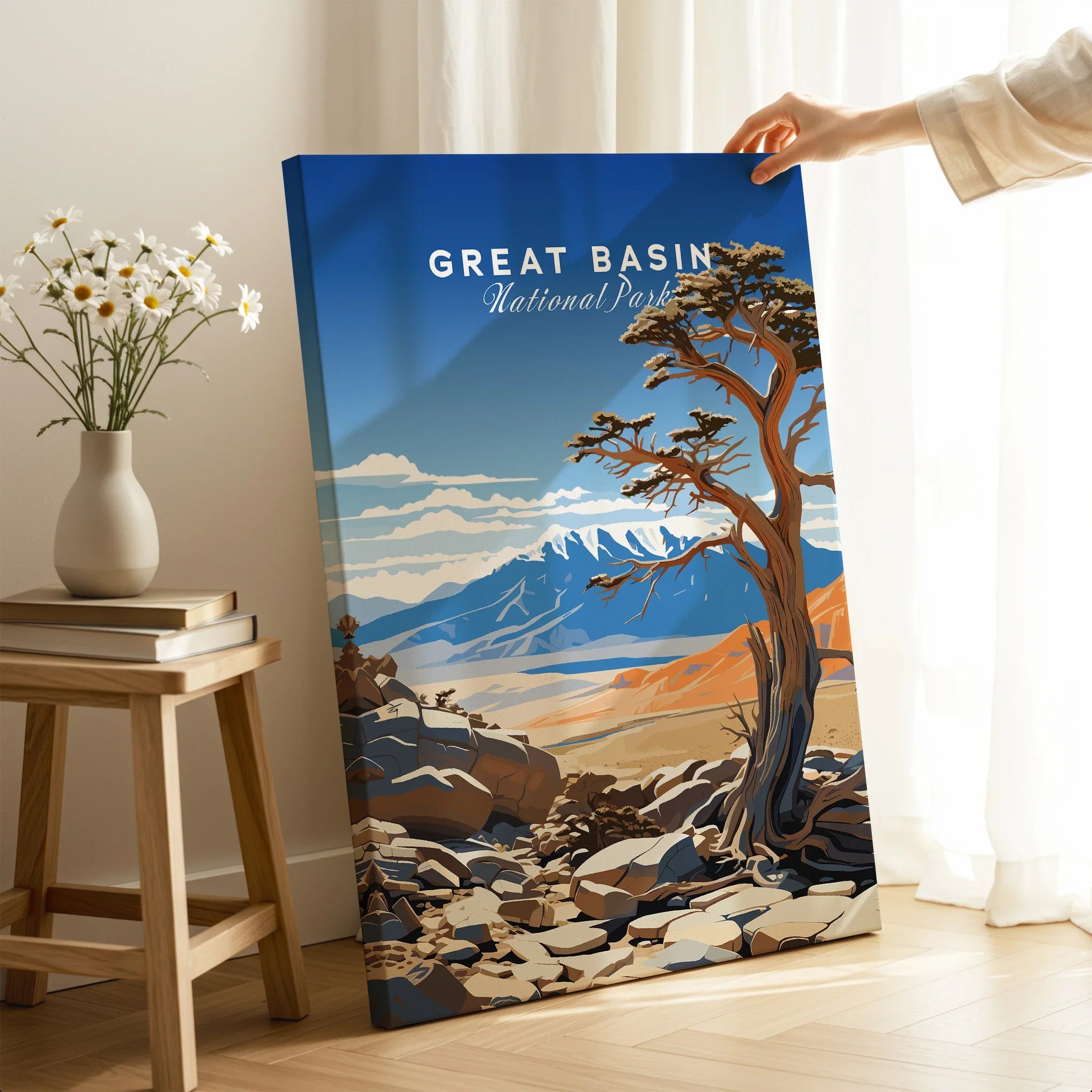 Hand holding Great Basin National Park travel poster print with mountain landscape in modern decor