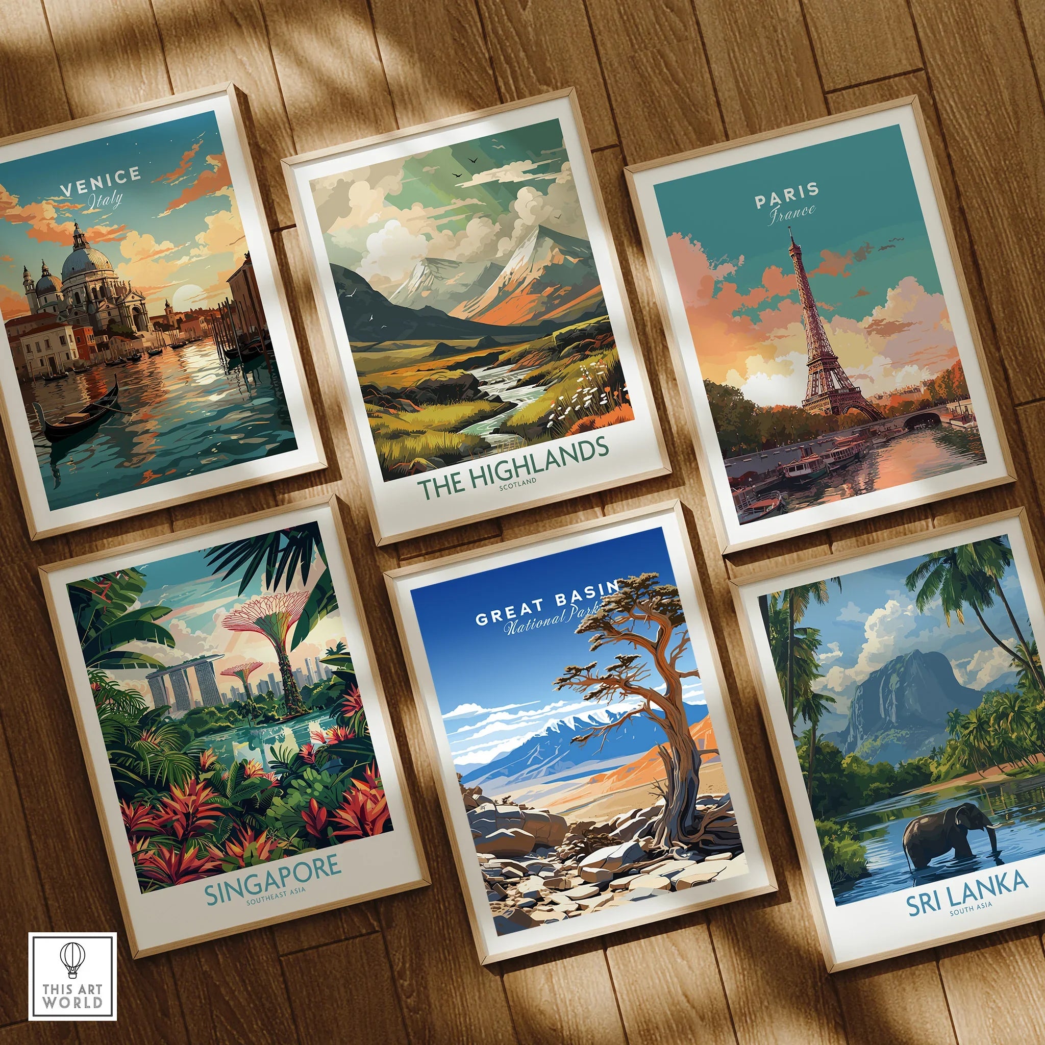 Set of six framed travel posters featuring Venice, Paris, Great Basin, Highlands, Singapore, Sri Lanka on a wooden floor