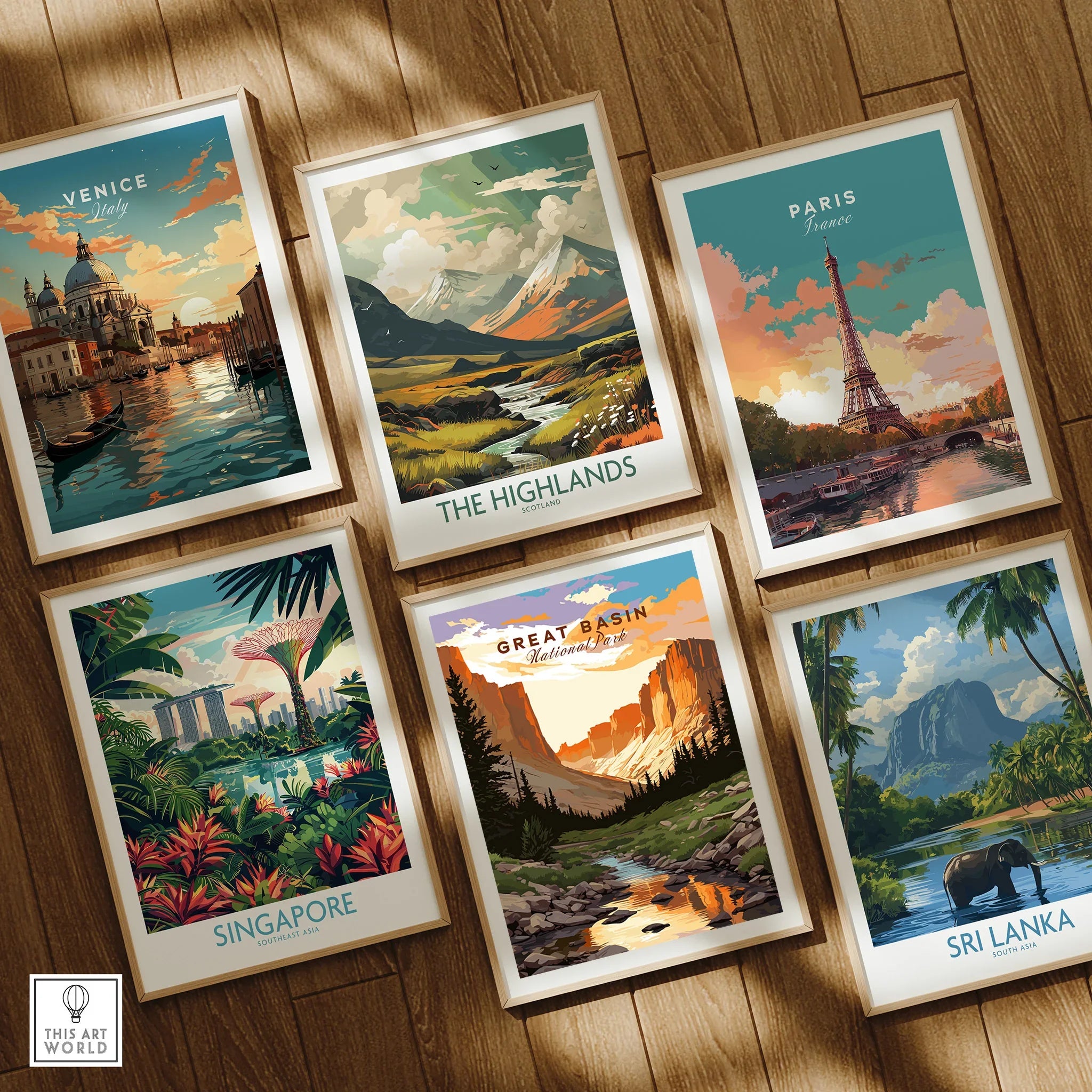 Set of six framed travel prints featuring Venice, Paris, Singapore, Great Basin, Highlands, Sri Lanka on wooden floor