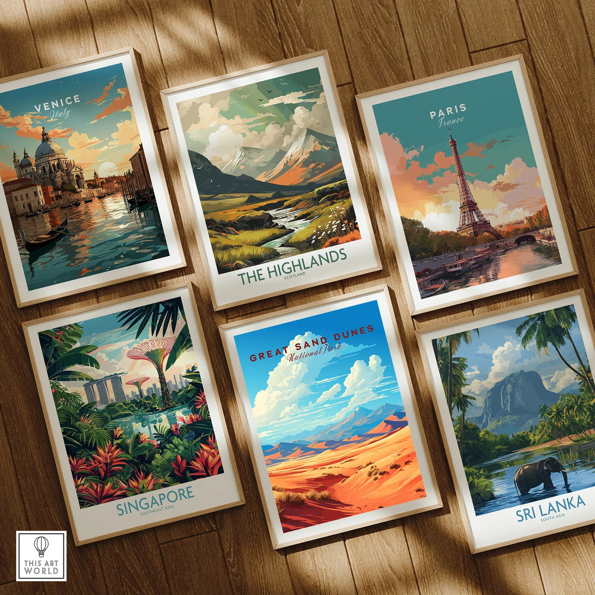 Framed travel posters of Venice, Highlands, Paris, Singapore, Great Sand Dunes, and Sri Lanka on wooden floor.