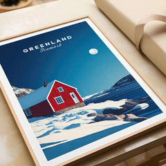 Greenland Travel Poster featuring a red house in a snowy landscape under a blue sky with moon.