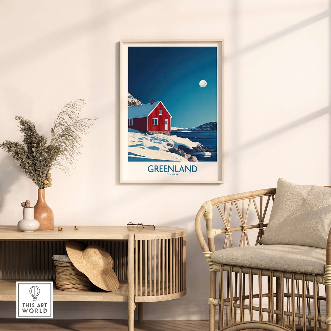 Framed Greenland wall art featuring a red house against a snowy landscape and moonlit sky in a modern interior setting.