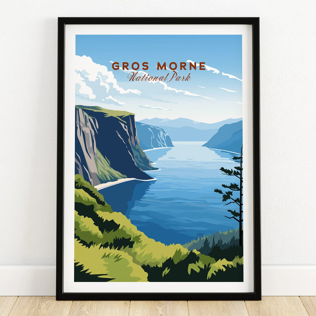 Gros Morne National Park art print in black frame, landscape with cliffs and water, on wooden floor