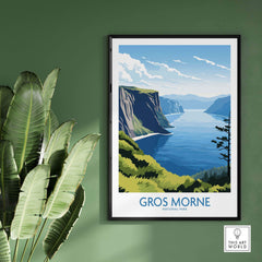 Gros Morne National Park print featuring dramatic cliffs, blue water, and lush greenery on a wall.