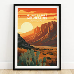 Guadalupe Mountains National Park art print in black frame, desert landscape with cacti and sunset.