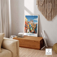 Guanajuato Mexico Art Print displayed in a cozy living room setting, showcasing vibrant colors and cultural beauty.