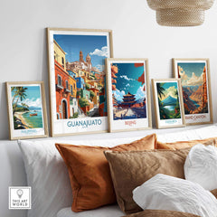 Guanajuato Mexico Art Print displayed among travel posters on a stylish wall, showcasing vibrant colors and culture.