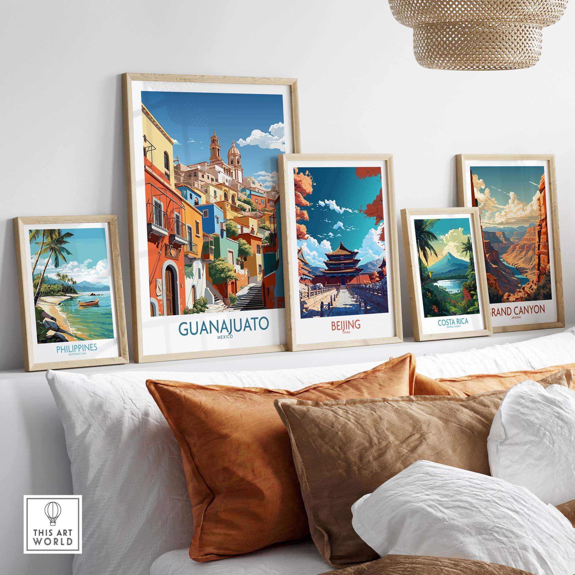 Guanajuato Mexico Art Print displayed among travel posters on a stylish wall, showcasing vibrant colors and culture.