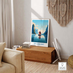 Ha Long Bay wall art featuring a Vietnamese Junk Boat and stunning turquoise waters in a modern room setting.