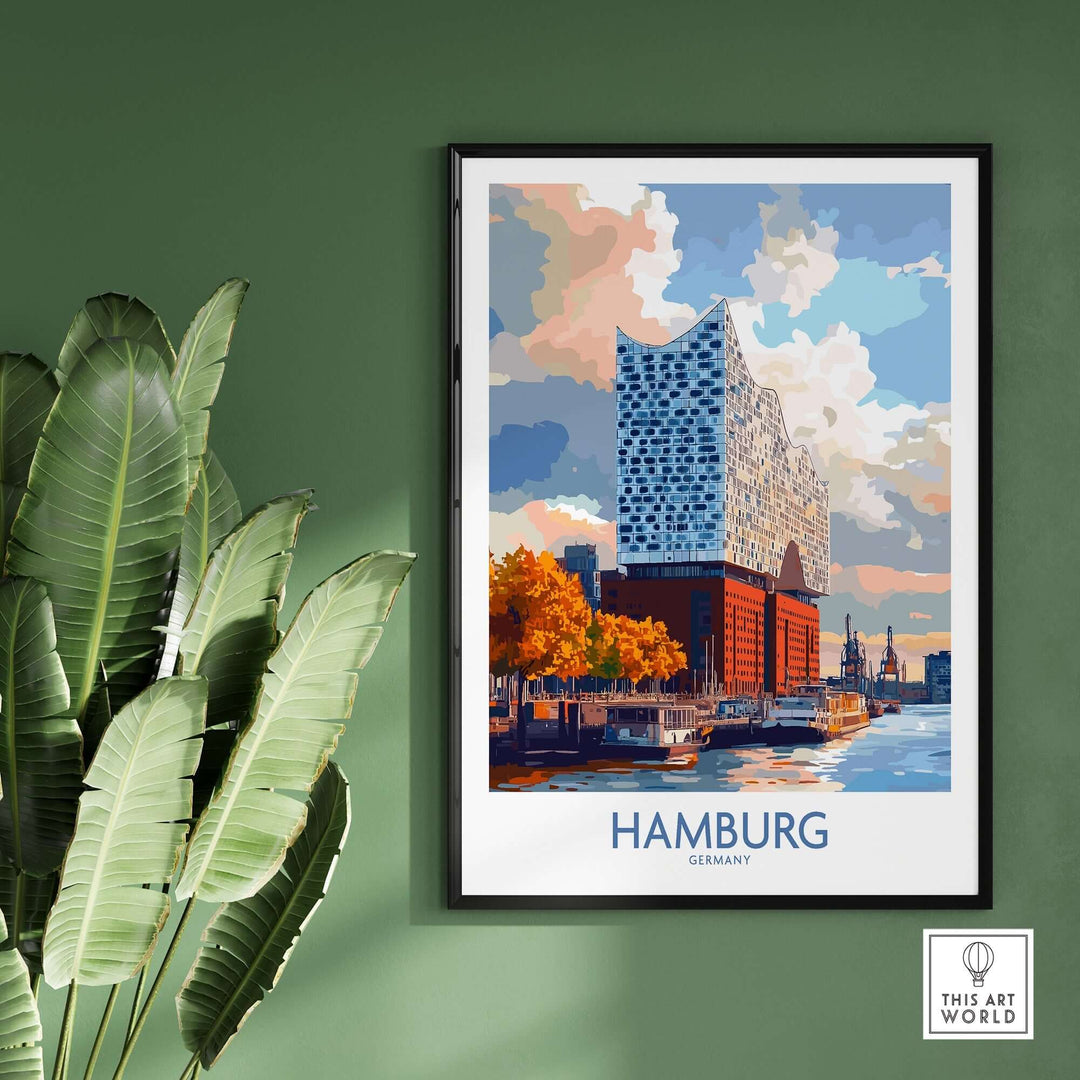 Hamburg poster showcasing the iconic Elbphilharmonie, framed on a green wall with tropical leaves nearby.