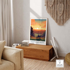 Hampstead Heath poster displayed in a cozy living room, featuring a scenic view of London during sunset.