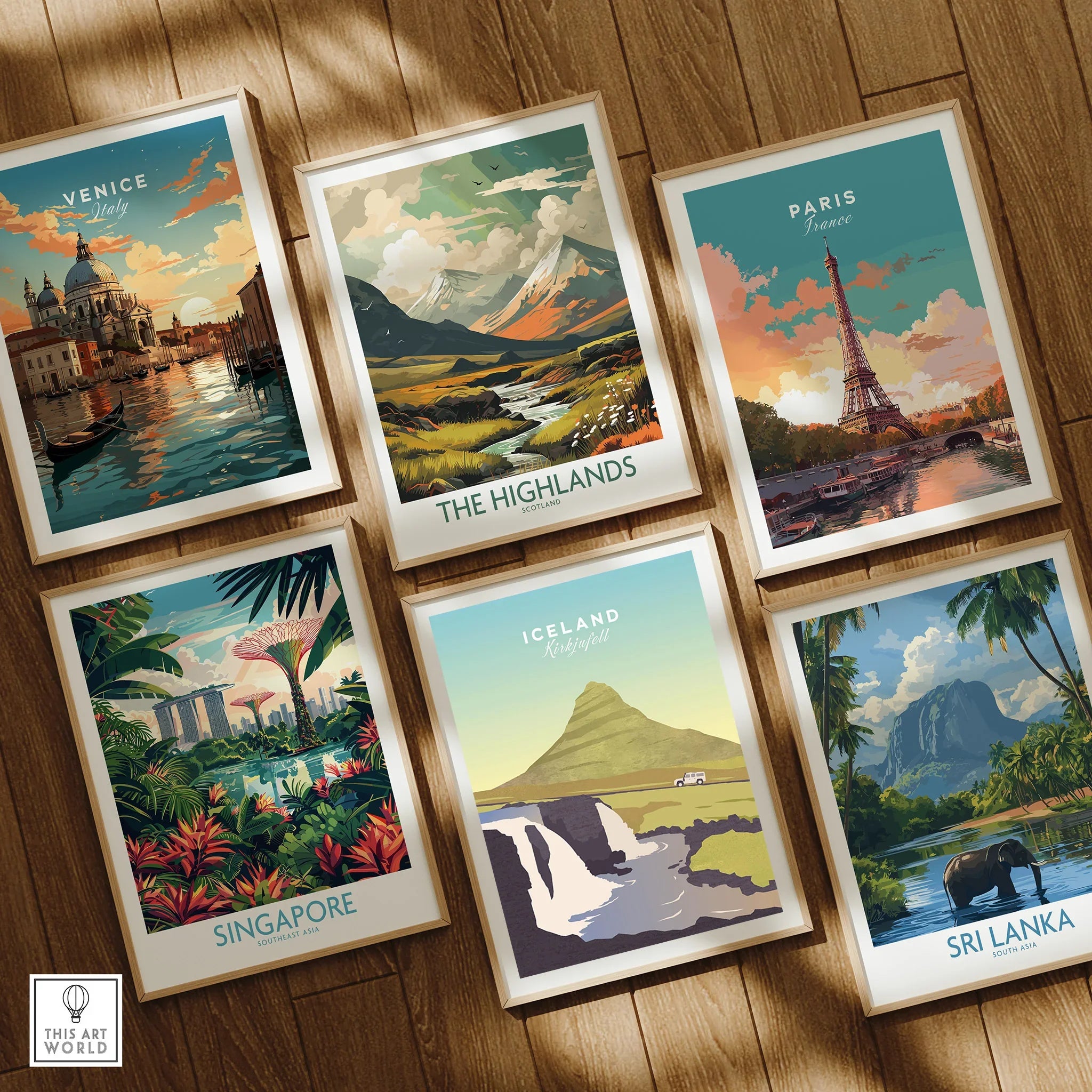 Framed travel posters of Venice, Paris, Highlands, Singapore, Iceland, Sri Lanka on wood wall