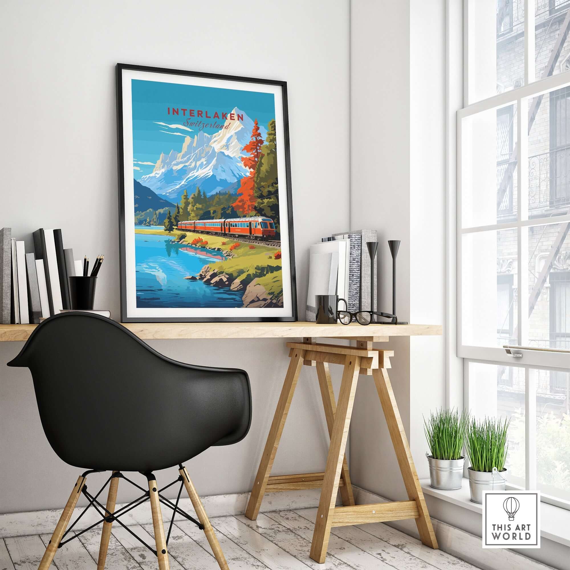 Interlaken Print Switzerland displayed in a modern workspace featuring a picturesque landscape and iconic train.