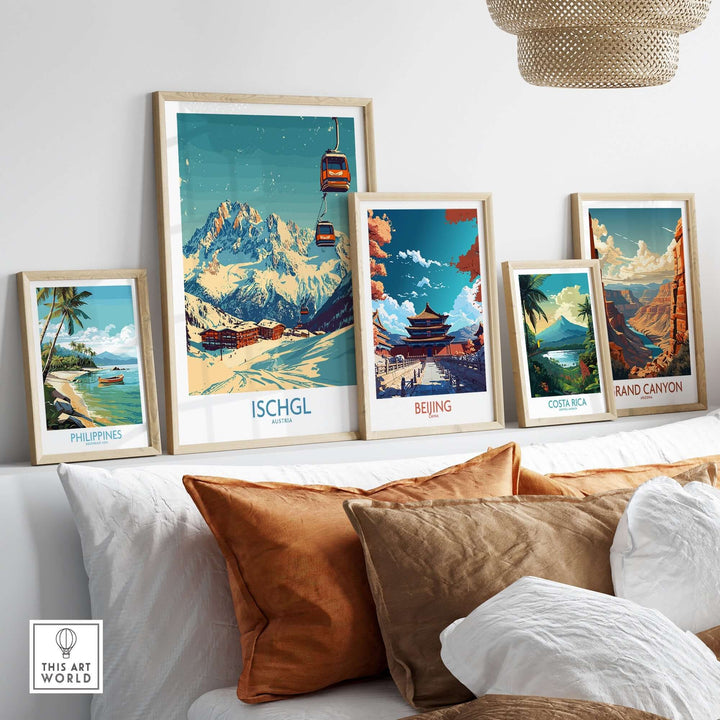 Stylish wall display of travel-themed posters including Ischgl, Beijing, Costa Rica, and the Grand Canyon in a cozy setting.