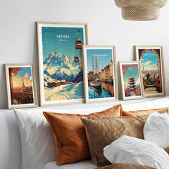 Ischgl Ski Print artwork displayed among other travel prints on a cozy sofa, highlighting stunning mountain views.