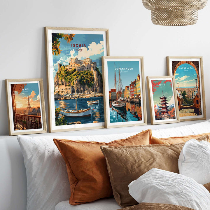 Ischia Travel Print and other city prints displayed in elegant frames above a stylish sofa, enhancing home decor.