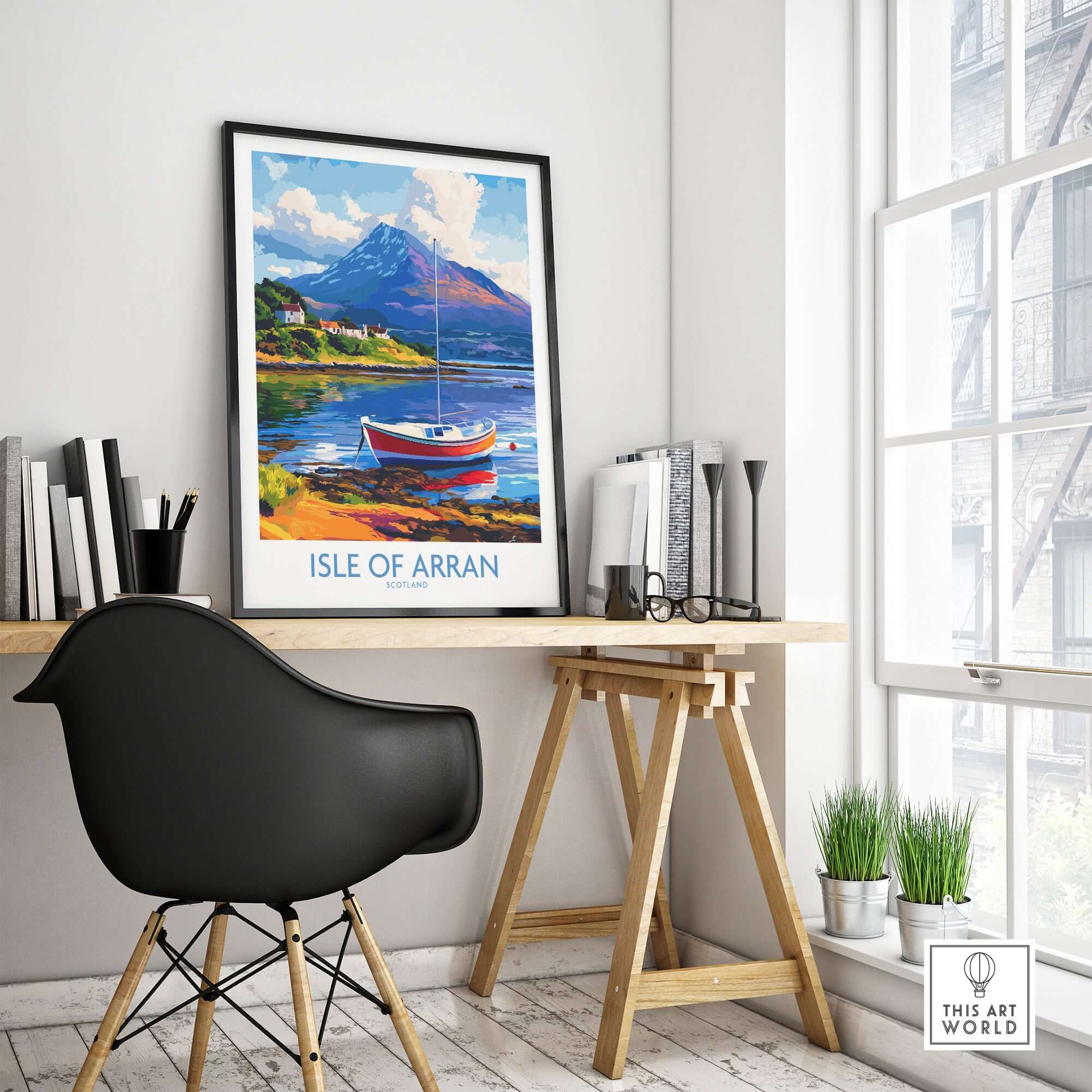 Isle of Arran Poster Scotland displayed in a modern office setting, showcasing picturesque views of the isle.