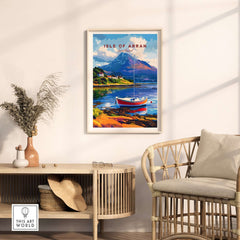 Isle of Arran Print Scotland displayed in a stylish living room with a coastal landscape and a boat.