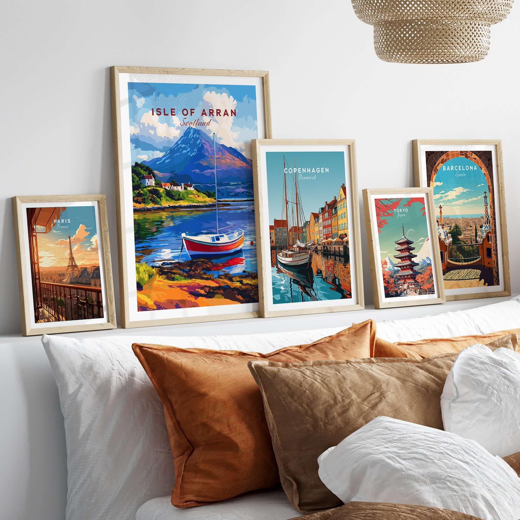 Isle of Arran Print Scotland featured among various travel art prints on a stylish wall display.