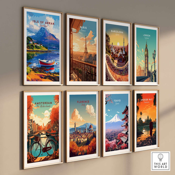 Gallery wall featuring vibrant travel prints, including Isle of Arran, Paris, Barcelona, and London.