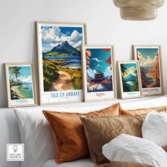 Isle of Arran Scotland Poster displayed among other travel posters in a cozy living room setting.