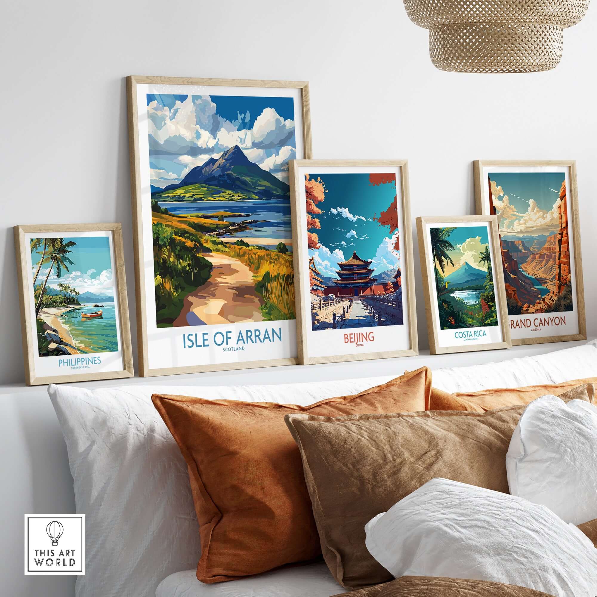 Isle of Arran Scotland Poster displayed among other travel posters in a cozy living room setting.
