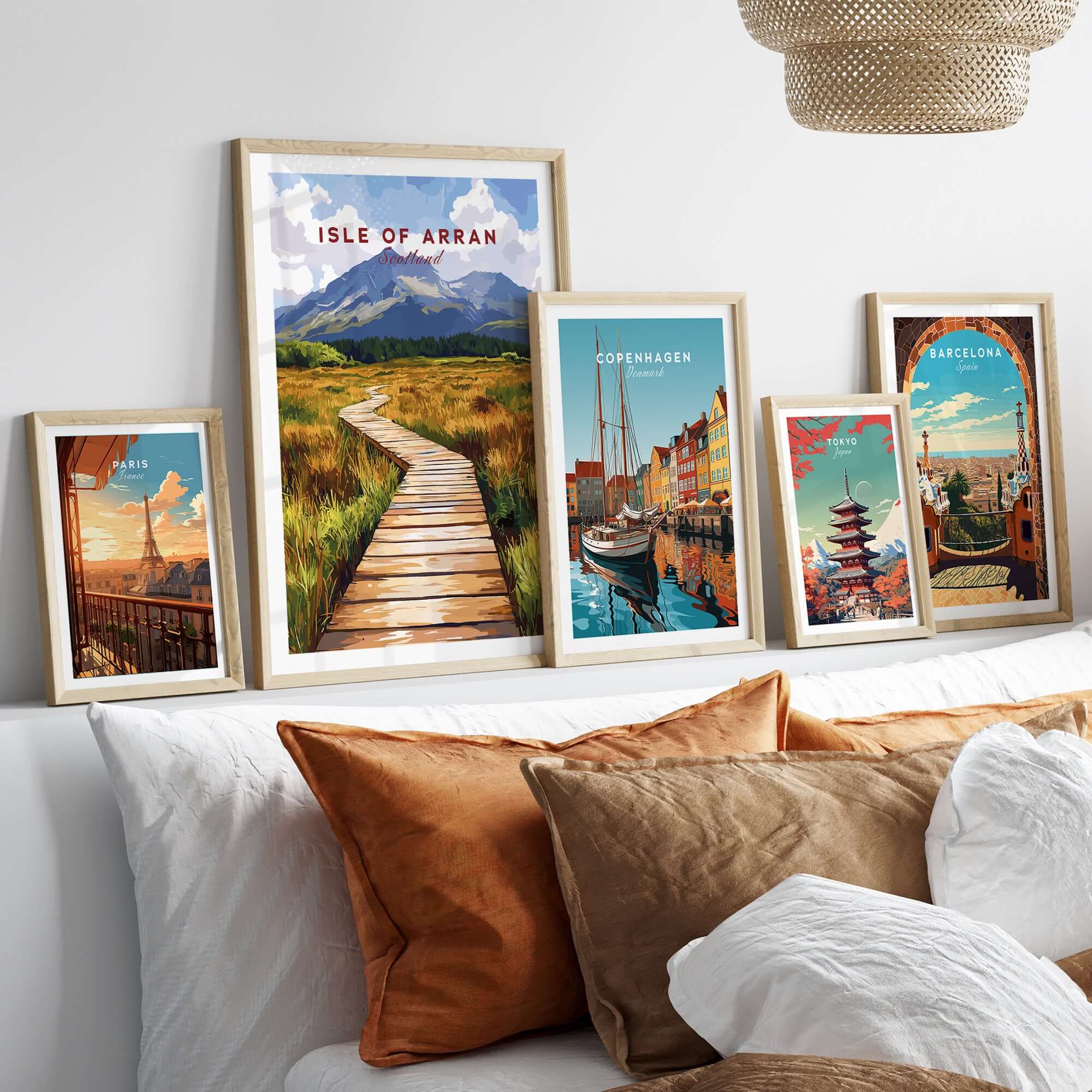 Isle of Arran Wall Art featuring stunning landscapes in a modern living room setting with various destination artworks.