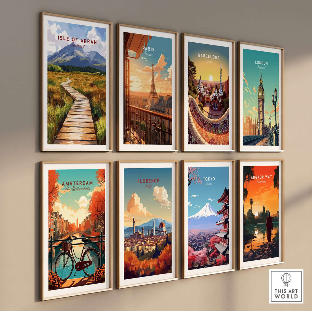 Collection of vibrant travel posters including Isle of Arran, Paris, and Tokyo, displayed on a wall.