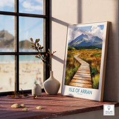 Isle of Arran Wall Art Print displayed on a shelf, capturing the scenic beauty of the Scottish island.