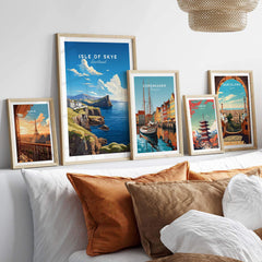 Isle of Skye Poster displayed among other travel posters in an elegant living room setting with decorative pillows.
