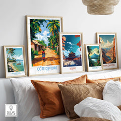 Ivory Coast Travel Poster - Côte d'Ivoire Wall Decor, African Art Print among other travel posters on a stylish shelf.
