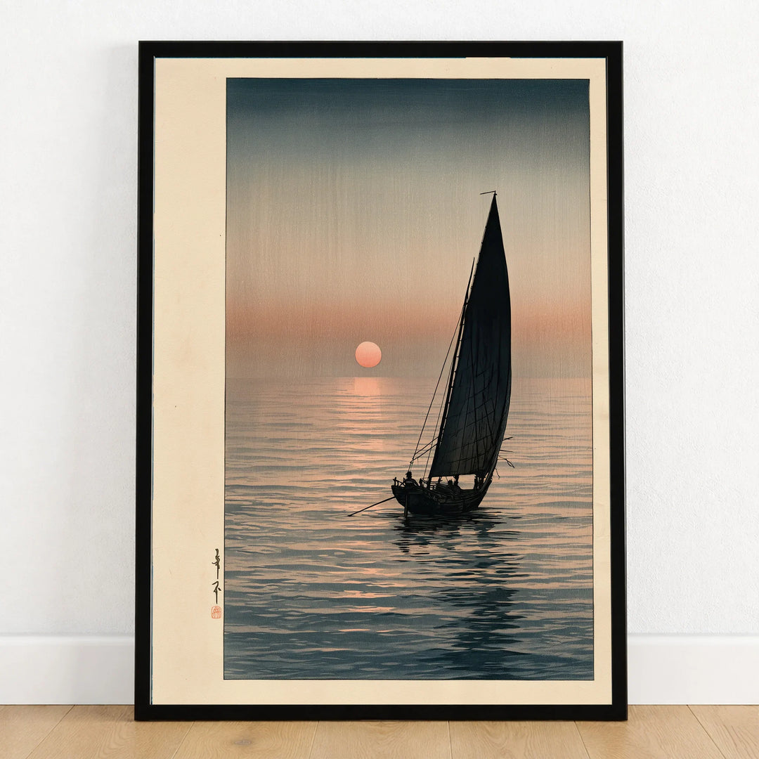 Japanese Sunset Seascape Art Print – Vintage Boat Wall Art — art print in black frame on wooden floor