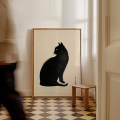 Japanese Black Cat Art Print – Vintage Japanese Wall Art — framed canvas on floor man walking past