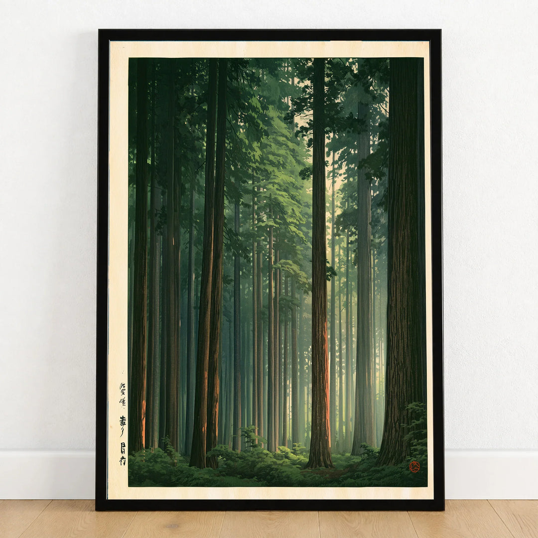 Japanese Cedar Forest Art Print – Vintage Landscape Wall Art — art print in black frame on wooden floor