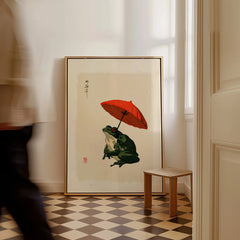 Japanese Frog Art Print – Red Umbrella Vintage Wall Art — framed canvas on floor man walking past