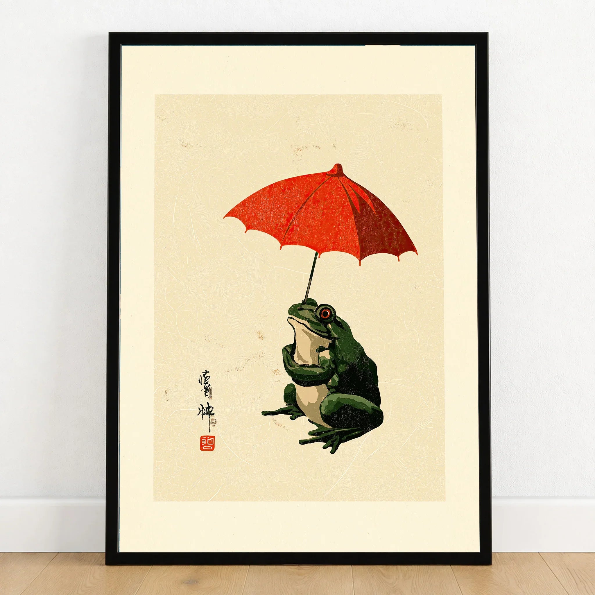 Japanese Frog Wall Art – Vintage Umbrella Art Print — art print in black frame on wooden floor
