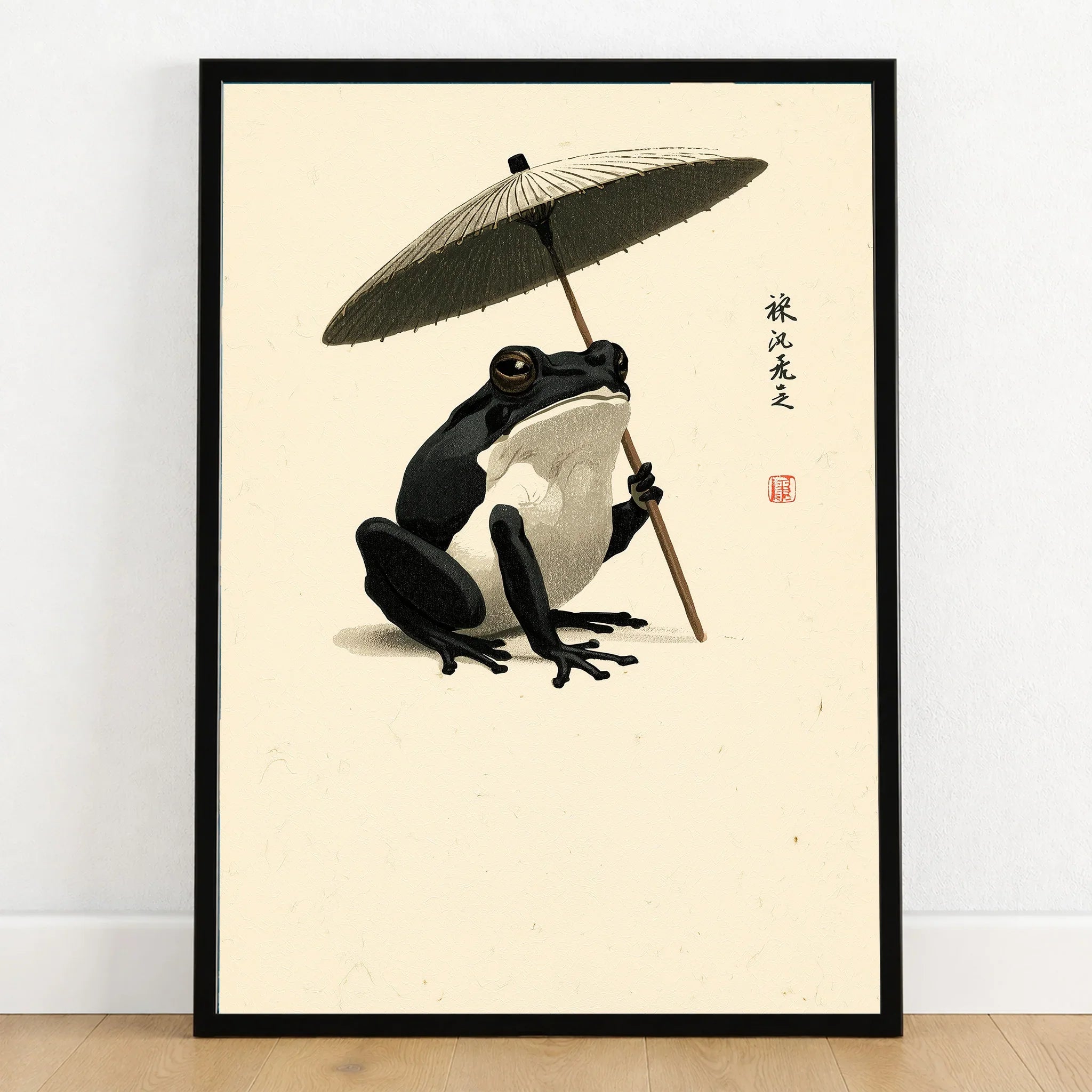 Japanese Frog Art Print – Traditional Umbrella Wall Decor — art print in black frame on wooden floor