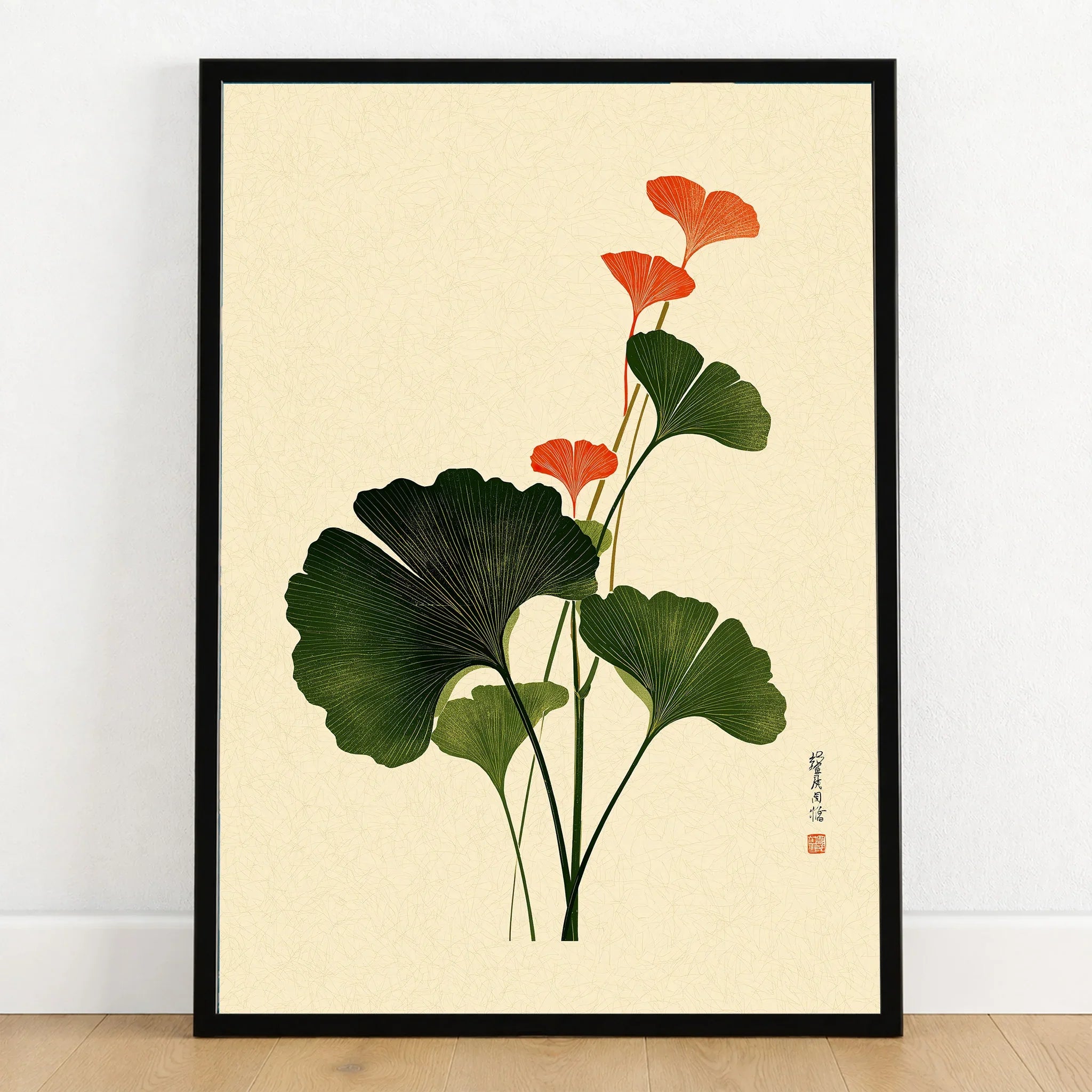 Japanese Ginkgo Art Print – Green & Red Botanical Wall Art — art print in black frame on wooden floor
