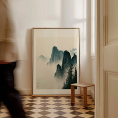 Japanese Misty Mountain Art Print – Vintage Landscape Wall Art — framed canvas on floor man walking past
