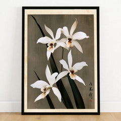 White Orchid Art Print – Vintage Japanese Botanical Wall Art — art print in black frame on wooden floor