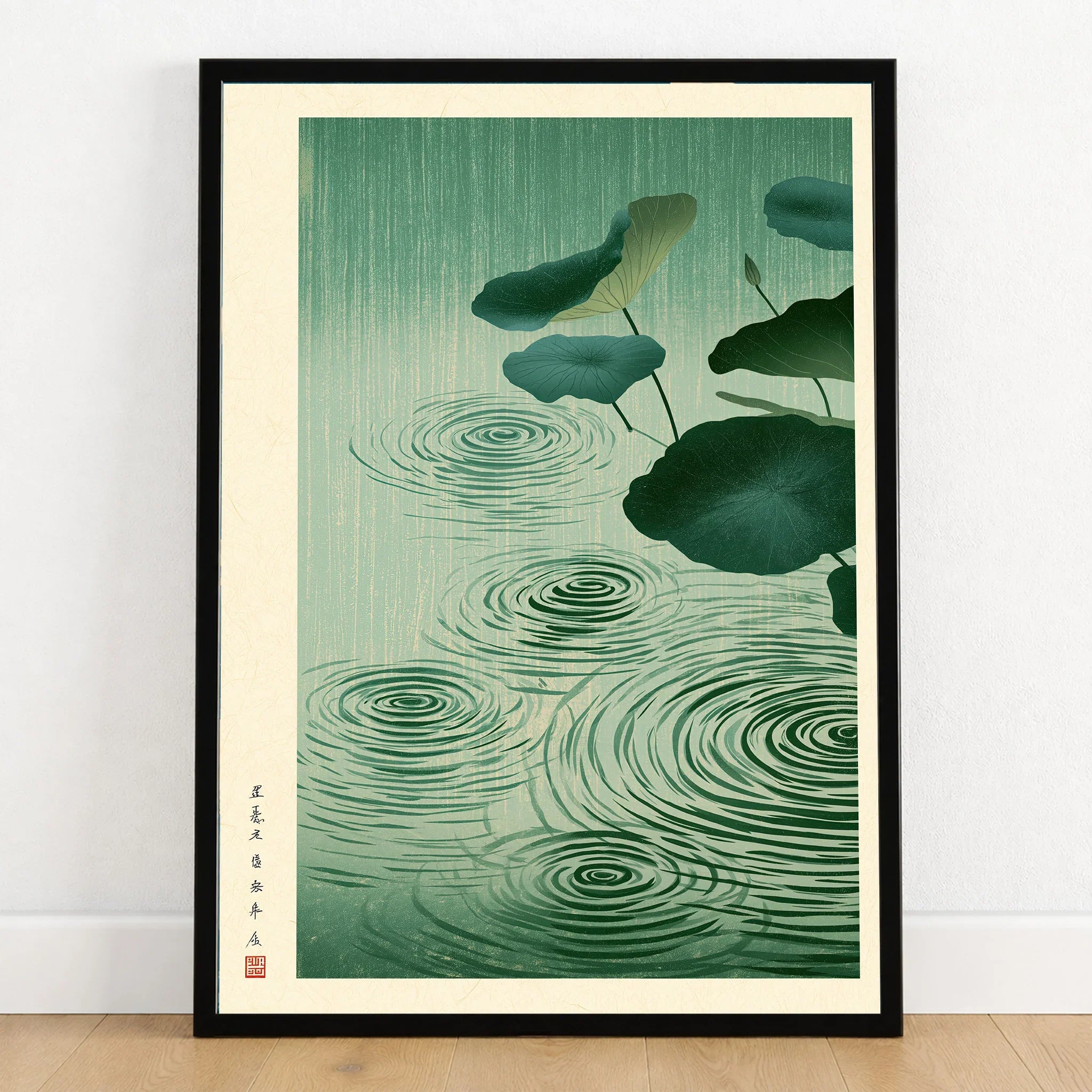 Japanese Lotus Pond Art Print – Rainy Vintage Wall Art — art print in black frame on wooden floor