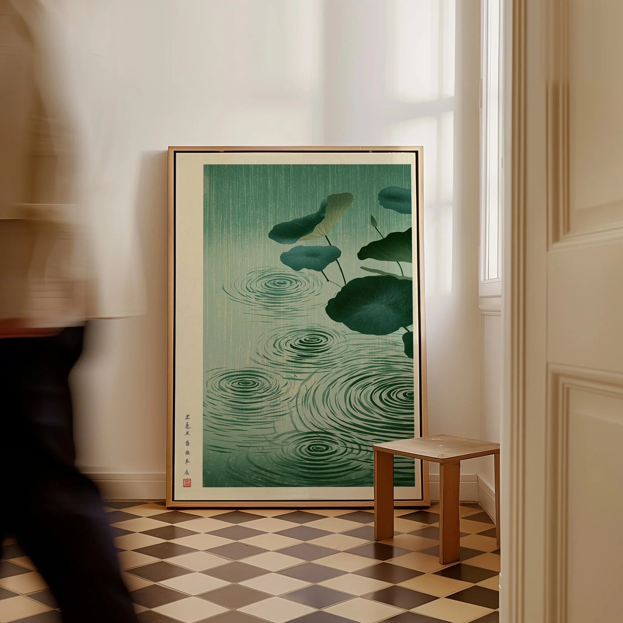 Japanese Lotus Pond Art Print – Rainy Vintage Wall Art — framed canvas on floor man walking past