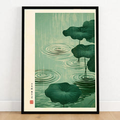 Japanese Pond Wall Art – Vintage Lotus & Rain Art Print — art print in black frame on wooden floor