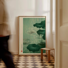 Japanese Pond Wall Art – Vintage Lotus & Rain Art Print — framed canvas on floor man walking past
